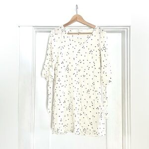 White tunic top with dalmatian spots; H&M size 2; New condition (never worn)